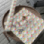 Thumbnail: Gift wrapped, scissors and roll on table. Colorful Music Gift Wrapping Paper | Fun Musical Theme Wrap.