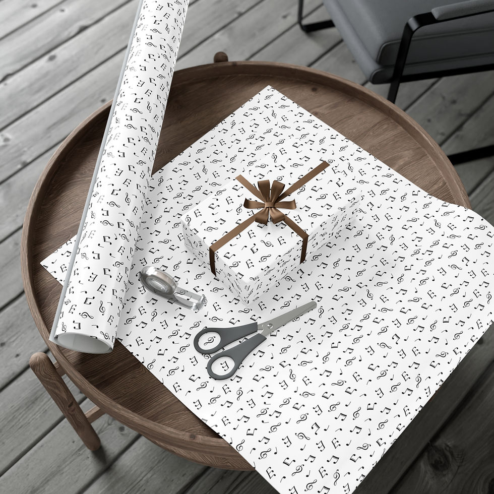 Thumbnail: Gift wrapped, decorated, paper roll on round table, scissors, gift box and bow.