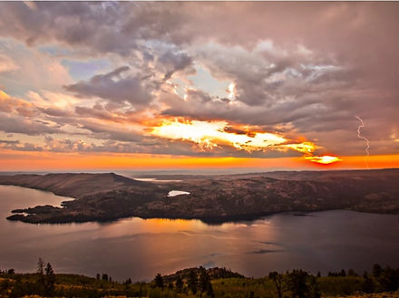 A spectacular sunset reflecting off of Fremont Lake in Pinedale, WY.