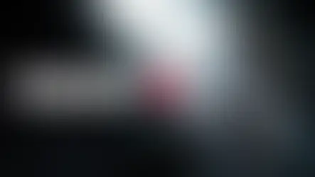 Soldier in gas mask in dark setting, light rays shining. Text "METRO 4" in bold, cracked white and red. Intense and ominous mood.