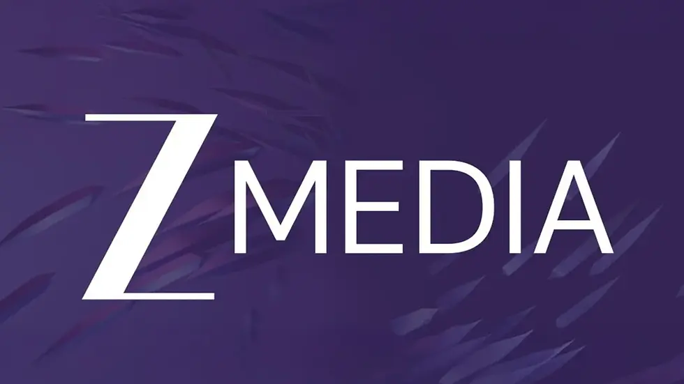 Zee Media's official logo featuring the company name in sleek white sans-serif font against a dynamic purple background with abstract geometric shapes and upward flourishes, symbolizing innovation and growth in the Indian media landscape, as highlighted in announcements about their upcoming esports entry.