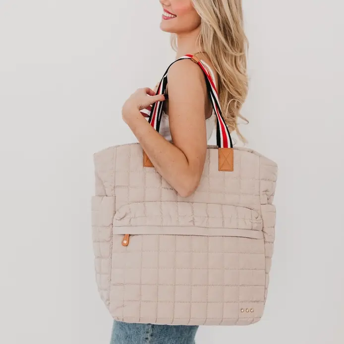 Thumbnail: TENLEY TOTE BAG ROLLER SIDE VIEW IN TAN