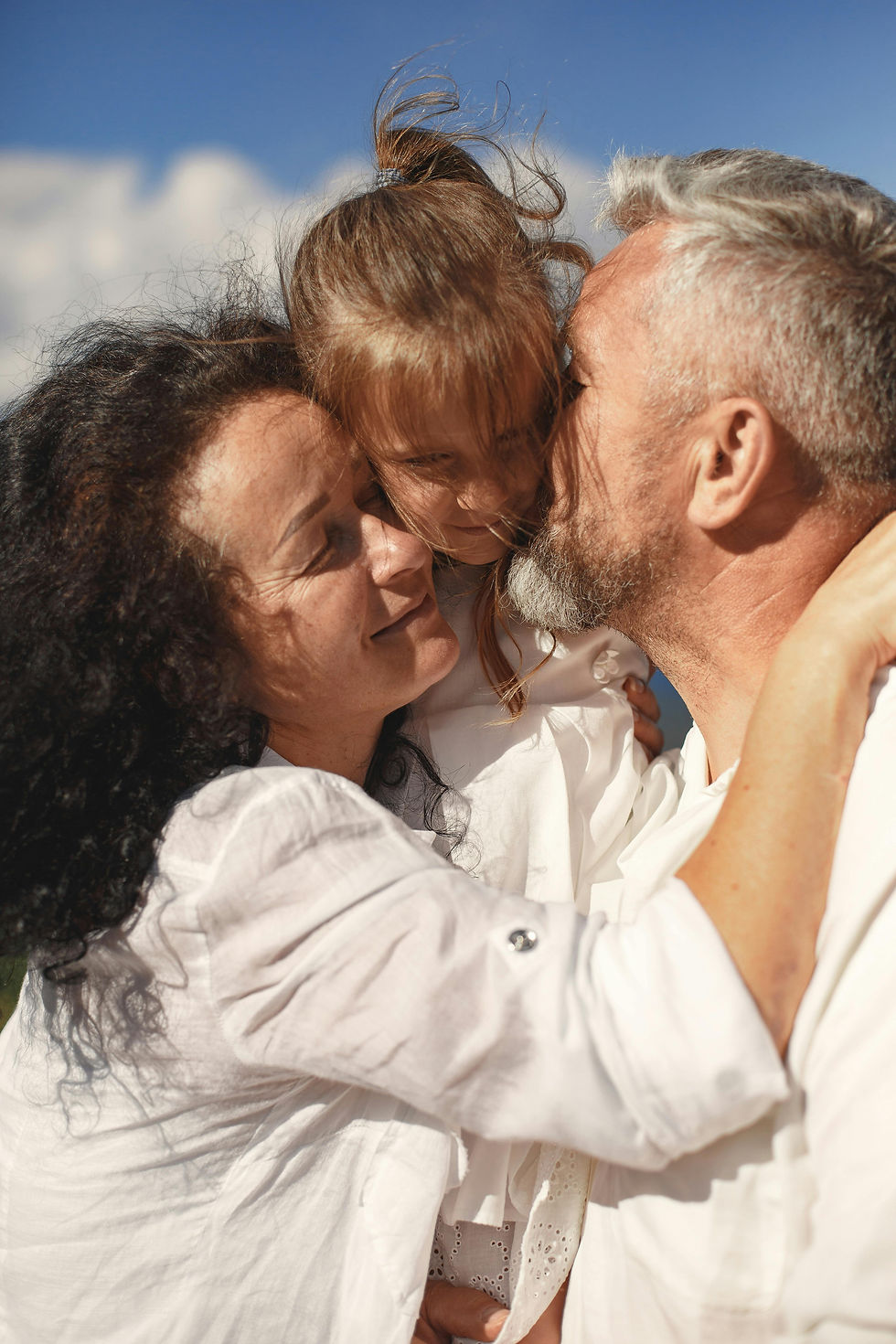 Expat family reviewing financial protection and income planning together overseas