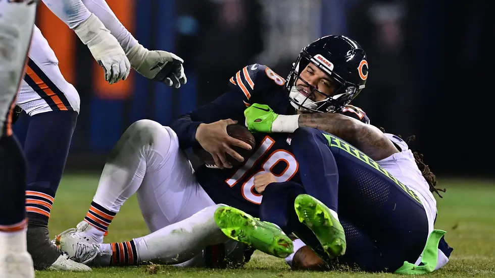 Caleb williams gwts sacked by the Seattle Seahawks