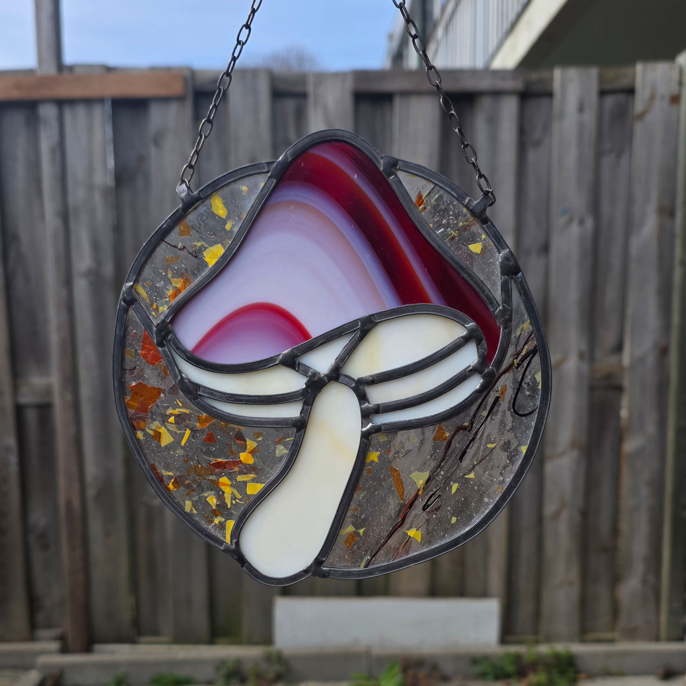 Paddestoel aan ketting