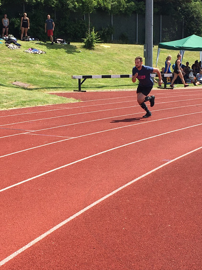 Scott running with determination, showcasing his endurance and focus as part of his training for the Atlantic Row.