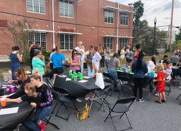 People participating at an outdoor Friends of Midtown event