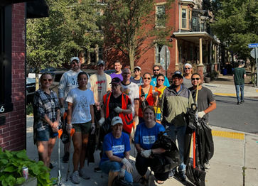 Group photo outside after a trash cleanup