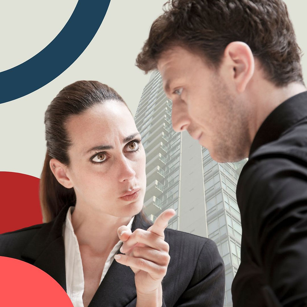 A woman pointing the finger at a man