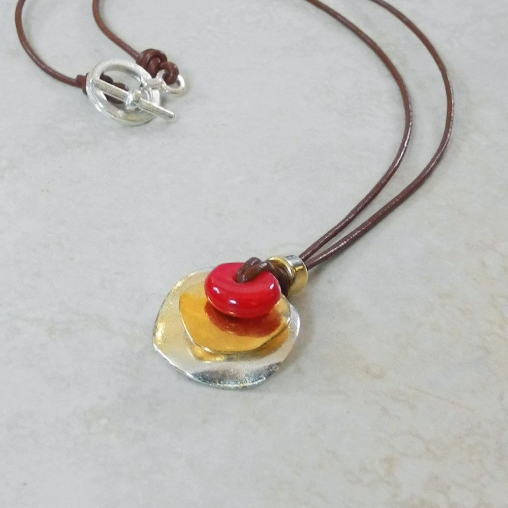 Double Stacked Silver and Gold Pendant with Coral on Leather Cord