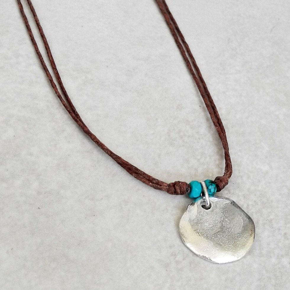 Thumbnail: Silver Charm Necklace with Turquoise Beads on Linen