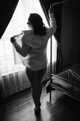 boudoir men's shirt against window