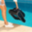 Woman holding Dolphin liberty 400 for pool by the water