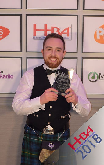 Ross picking up bronze award for male presenter.jpeg