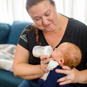 newborn care specialist in Ponte Vedra Beach, Florida paced bottle feeding a newborn
