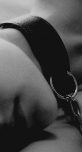 A submissive female wearing a collar