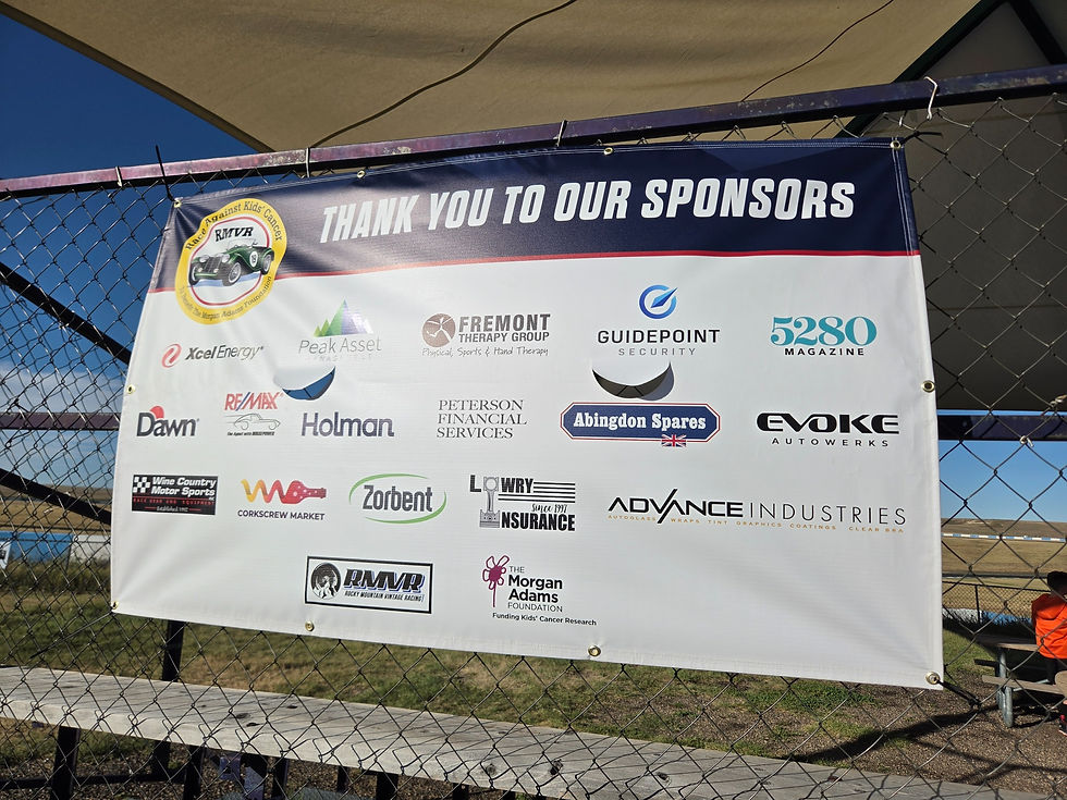 Community event banner recognizing local sponsors