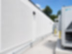 Perforated acoustic barrier used for noise control around mechanical equipment