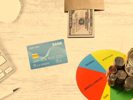 Cash envelopes and debit card budgeting app side by side, representing faith-based money management.