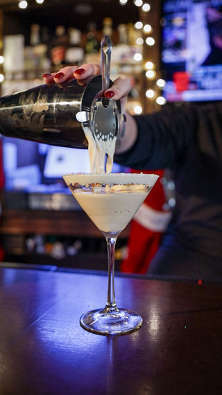 Mocktails and variety of drinks served to a customer.