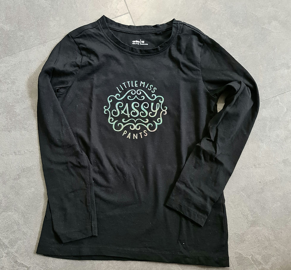Image: Glitter vinyl on cotton Tshirt.