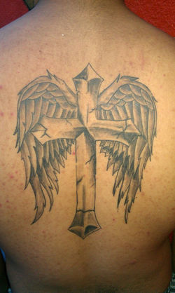 cross and wings tattoo.jpg