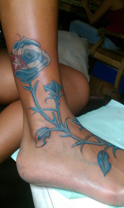 rose and cuba flag tattoo.jpg