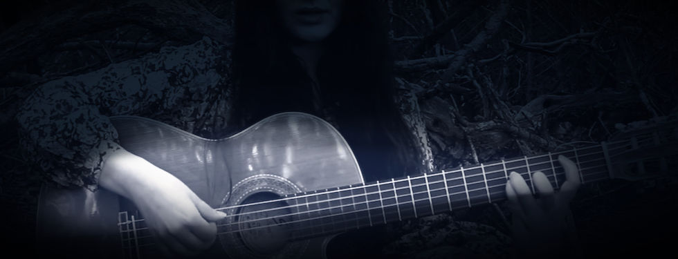 Guitar playing in woods 2_edited_edited.jpg