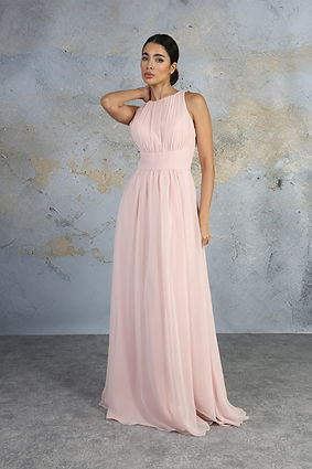 A woman in a pale dress