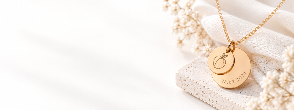 Delicate Gold Keepsake Pendant on Travertine.png