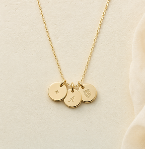 Gold-filled Held Together multiple-loss remembrance necklace with three personalised pendants.