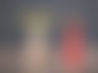 Wooden human figures with positive and sad faces reflecting good and bad workplace reputations.