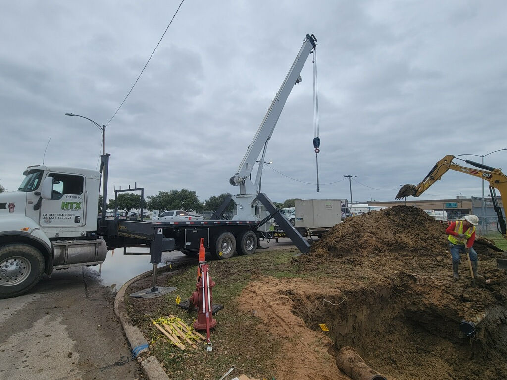 Precast Concrete Vault Transported by Crane