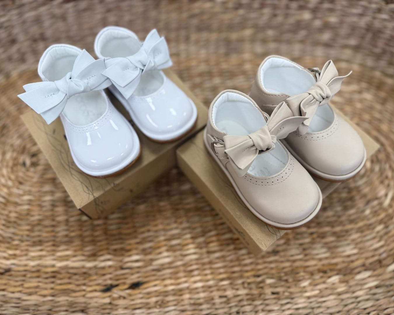 Borboleta Vitoria bow front shoes in a white patent leather and a nude beige leather