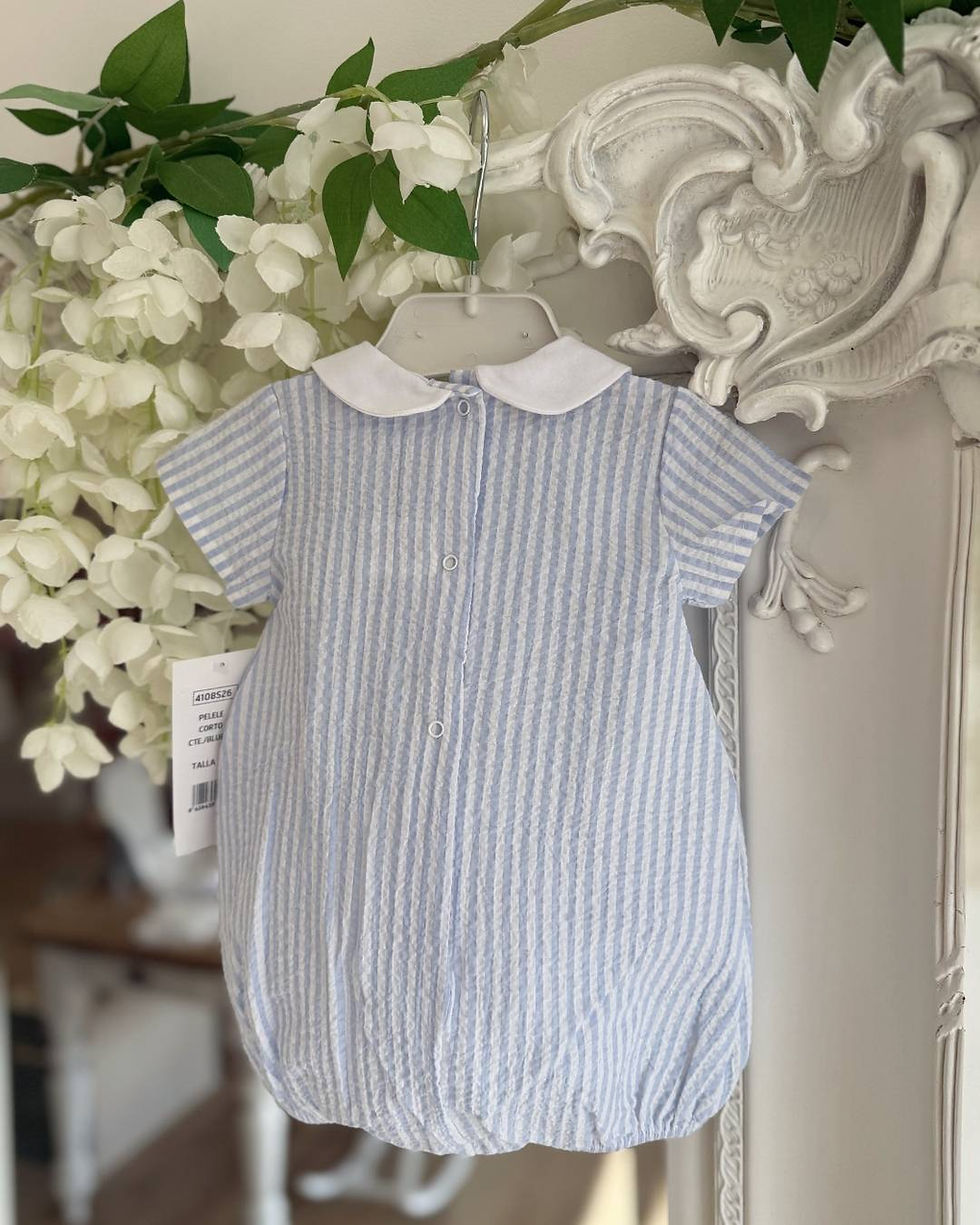 Thumbnail: Rapife blue and white seersucker romper with a white Peter Pan collar and two chest buttons
