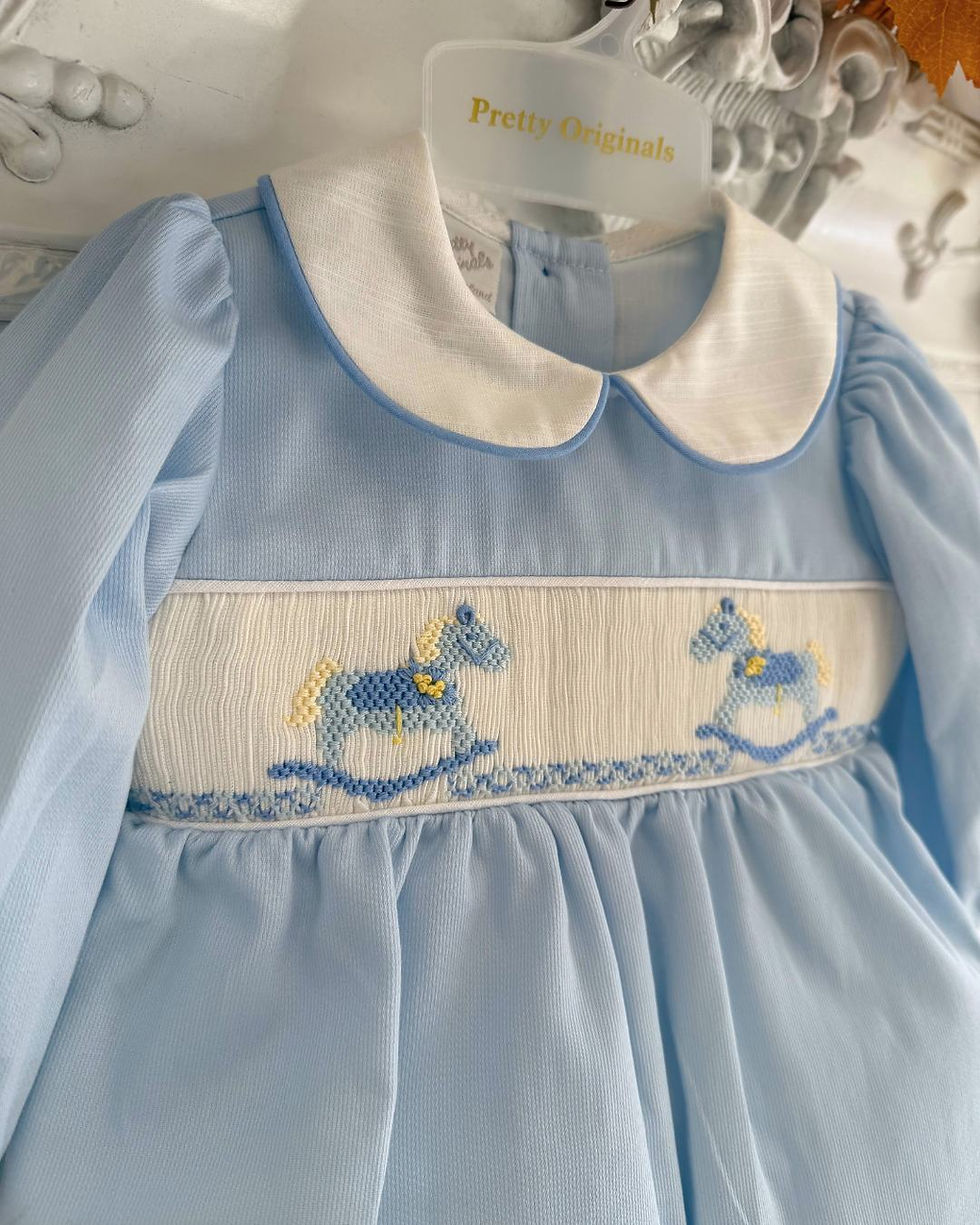 Pretty Originals smocked embroidered rocking horse chest and a white Peter Pan collar