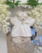 Deolinda Bodhi Stripe Shorts paired with a white collared shirt with contrasting beige stripes on the sleeve and collar