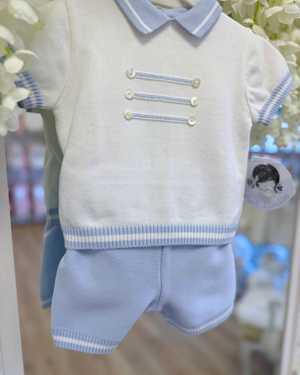 Thumbnail: Sarah Louise blue knit shorts paired with a white knit top with a blue knit collar and stripe trims