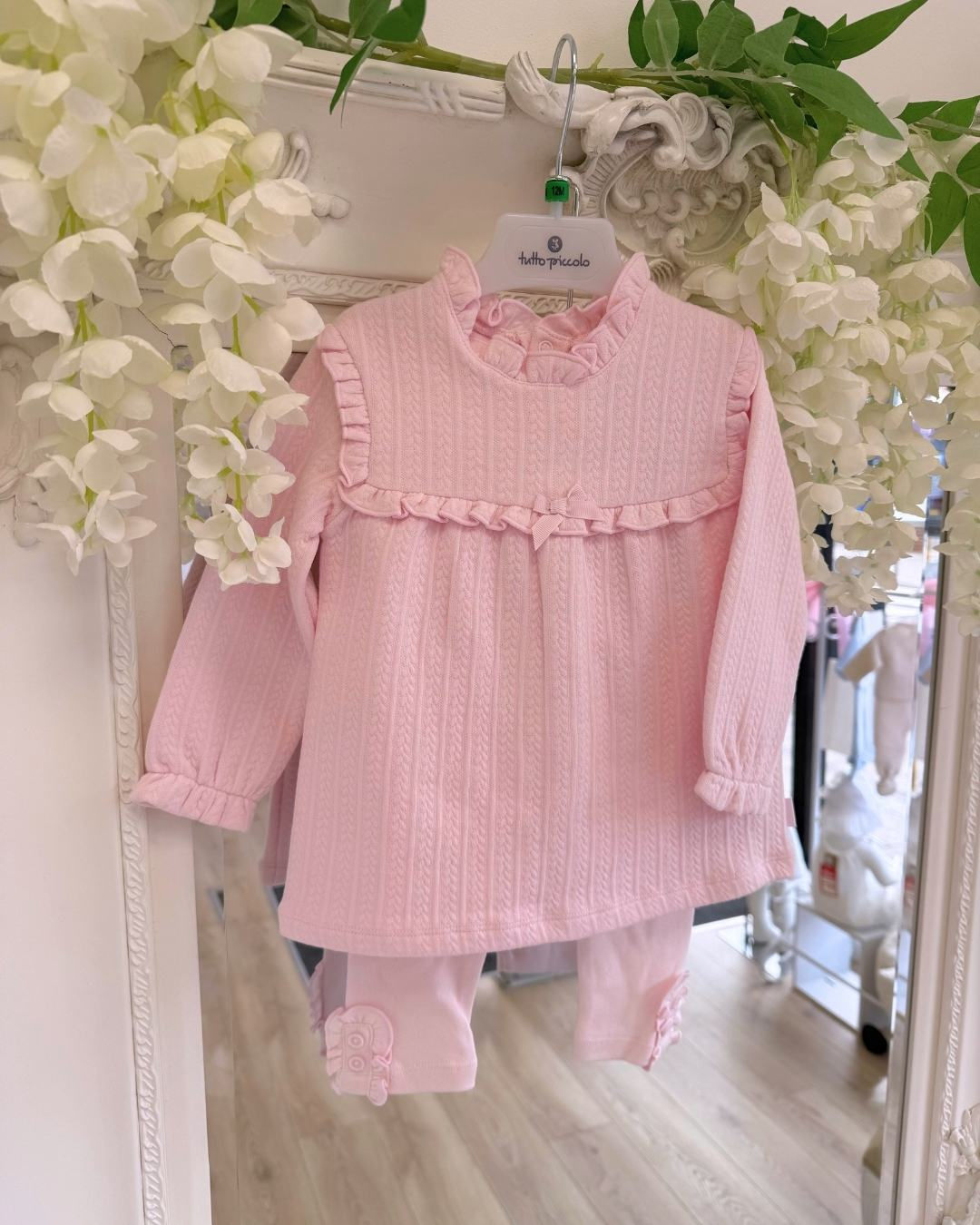 Tutto Piccolo Cable print frill pink top paired along with pink leggings