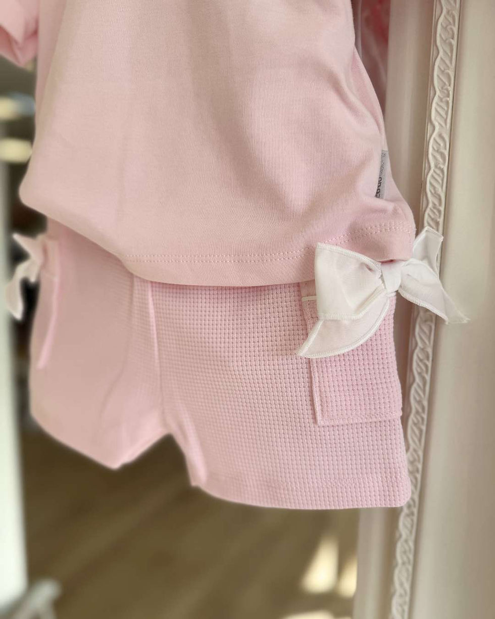 Thumbnail: Bluesbaby pink cotton short set with white bows on the arms and side pockets