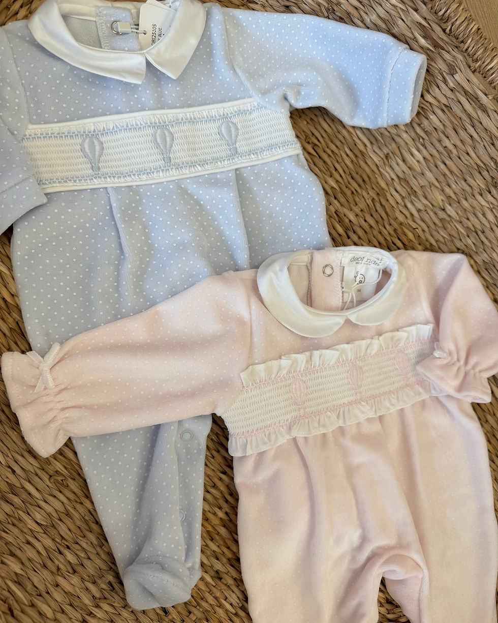 Deolinda Hot Air Balloon smocked babygrows in a soft pinkand blue