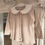 Thumbnail: Granlei beige knit legging and jumper set with a white statement collar trimmed in frill and a ribbon slot center going into