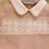 Thumbnail: Mintini beige smocked chest babygrow with a white collar