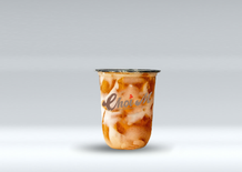 Choi ell drink with caramel and milk on a gray background.