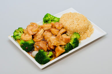 Plate of chicken, shrimp, broccoli, and fried rice