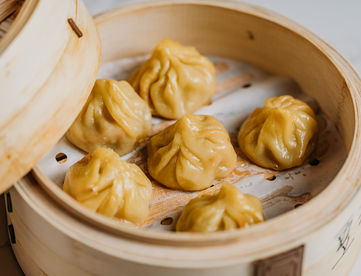 Steamed dumplings inside wooden steamer, Ma’s Kitchen Dim Sum and Noodles.