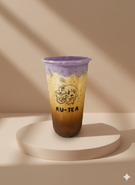KU-TEA drink with multiple layers on a neutral background, logo visible.