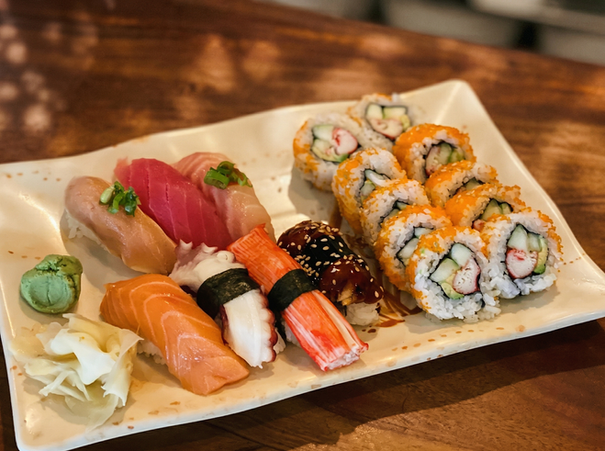 Plate of nigiri sushi and California rolls