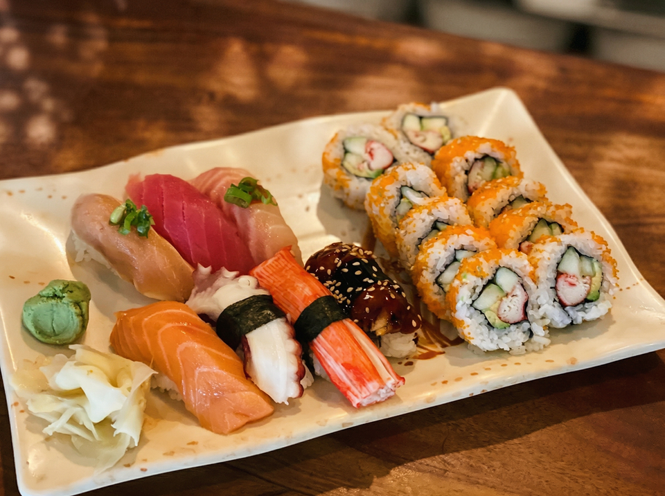 Plate of nigiri sushi and California rolls