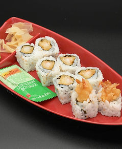 Shrimp tempura sushi rolls, KIKKOMAN less sodium soy sauce, on red boat plate.